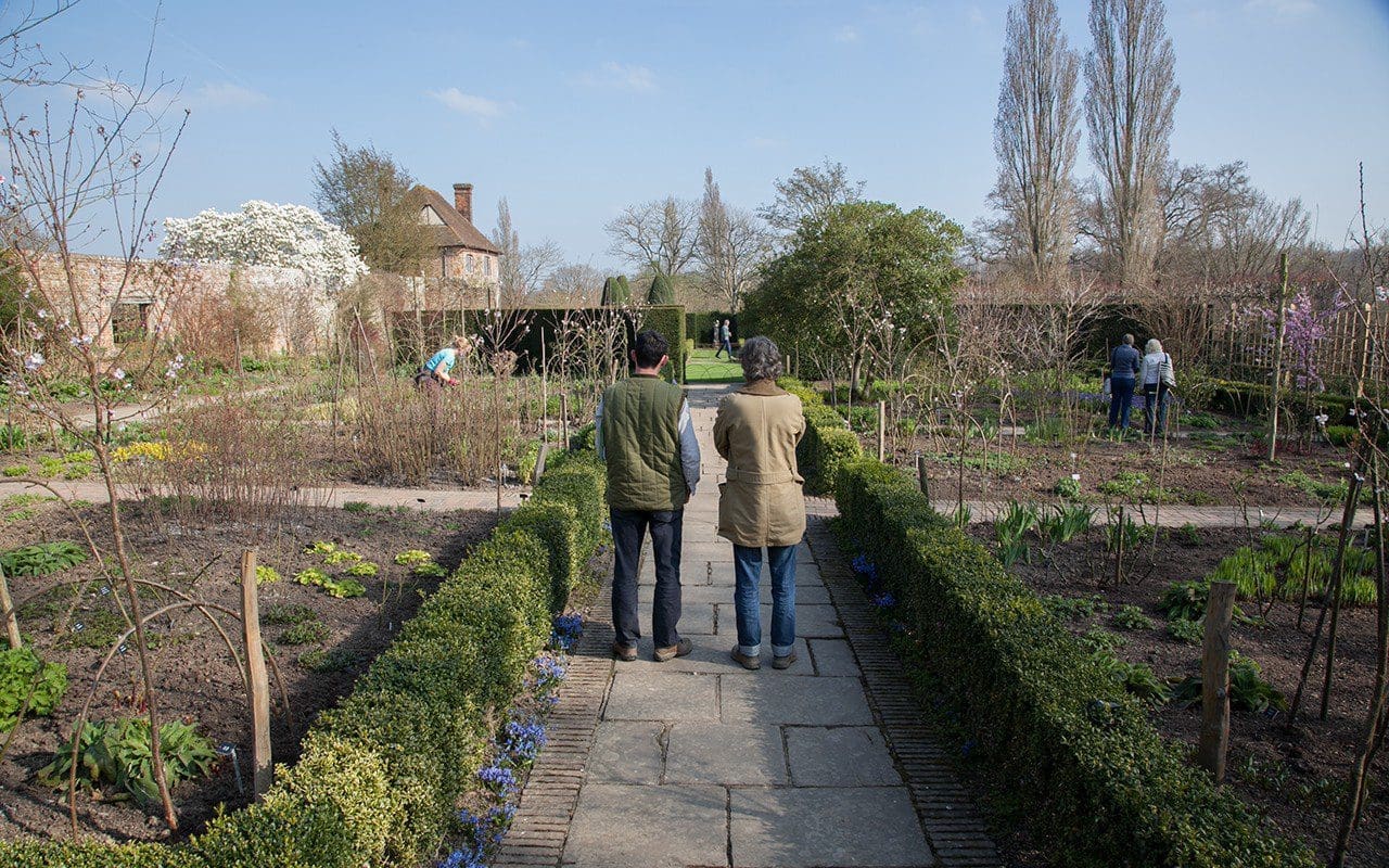 Head Gardener, Troy Scott-Smith and garden designer, Dan Pearson in the Rose Garden at Sissinghurst Castle by Huw Morgan