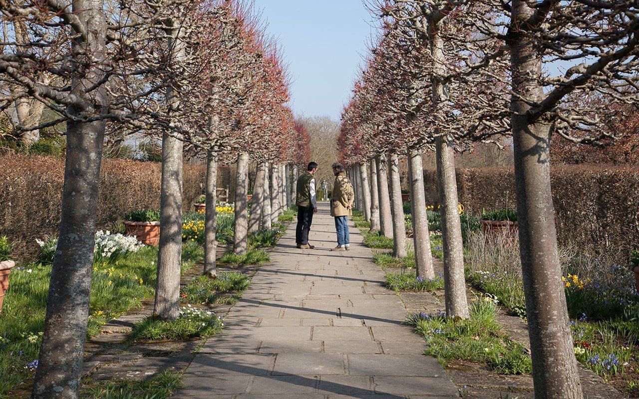 Head Gardener, Troy Scott-Smith and garden designer, Dan Pearson in the Lime Walk at Sissinghurst Castle by Huw Morgan